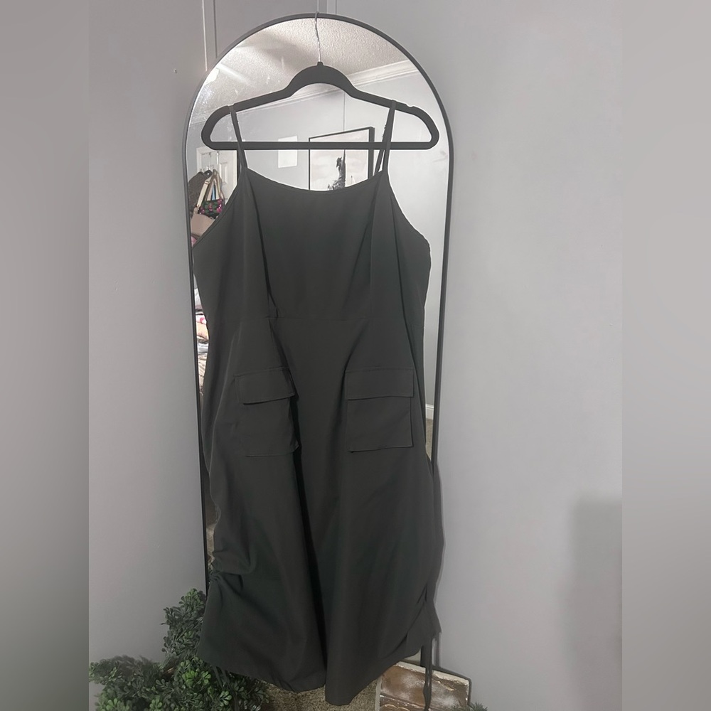A grey sleeveless jumper dress